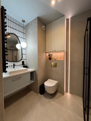 Ένα μπάνιο στο Apartament Wileńska