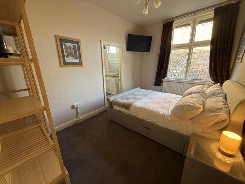 En eller flere senge i et værelse på The Black Horse Inn