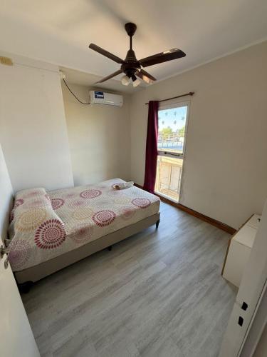 Ένα ή περισσότερα κρεβάτια σε δωμάτιο στο Departamento Fanti