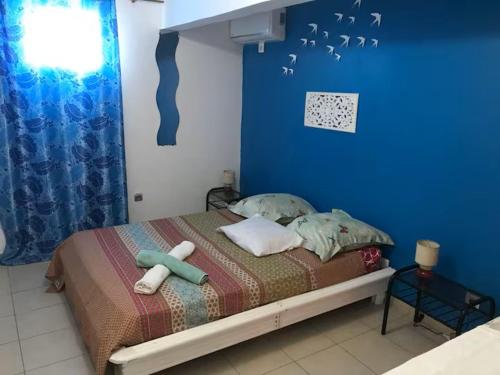 Postel nebo postele na pokoji v ubytování Sable dorée