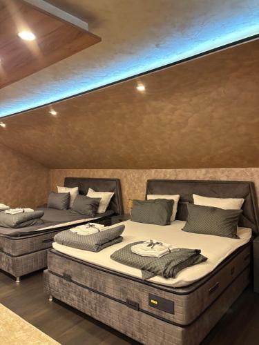 Ένα ή περισσότερα κρεβάτια σε δωμάτιο στο Motel & Restaurant Lašva