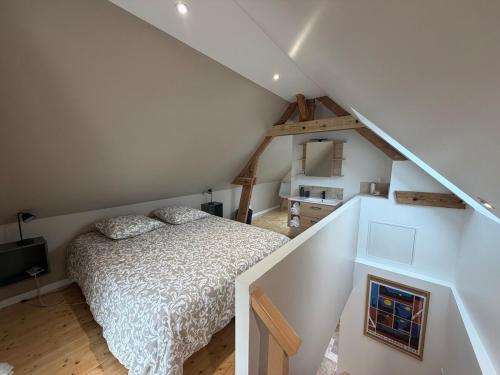 Postel nebo postele na pokoji v ubytování Catherine Maisonnette