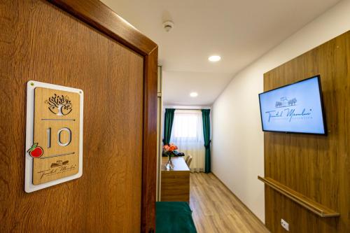 Fotografie z fotogalerie ubytování Pensiunea Ținutul Mărului 