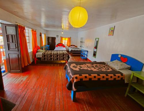 Postel nebo postele na pokoji v ubytování Hostel Rivendell Cusco
