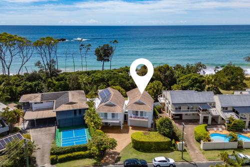 an aerial view of a house with a large house at Beachfront Retreat - Ducted Air - Free Wifi in Coffs Harbour