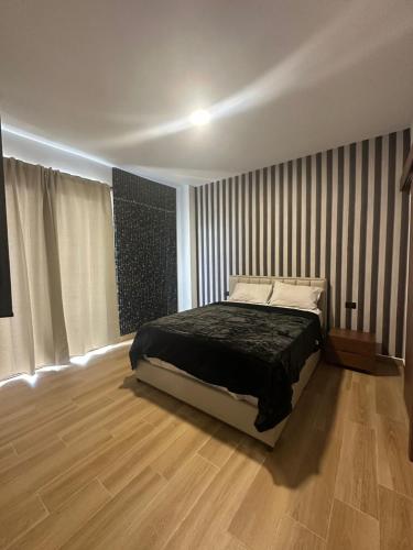 Ένα ή περισσότερα κρεβάτια σε δωμάτιο στο Los Magicos Apartments, Punta Cana