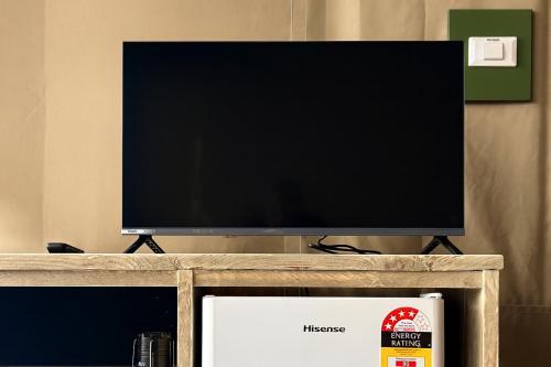 a flat screen tv sitting on top of a stand at Apollo Bay Recreation Reserve in Apollo Bay
