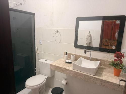 Phòng tắm tại Sítio São Gerardo - Aconchegante casa no campo.