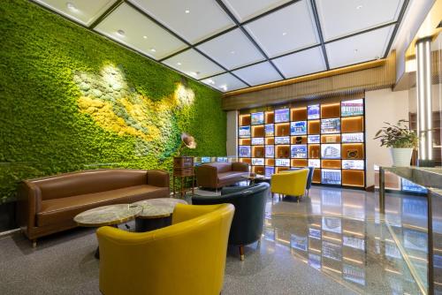 Χώρος καθιστικού στο Nost algia Hotel Beijing Panjiayuan Antique Market 时光漫步酒店北京潘家园劲松地铁站店 Free fresh ground coffee,Free laundry service