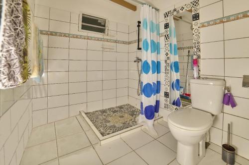 Koupelna v ubytování Pacifique un Bungalow charmant pour deux, entre mer et nature