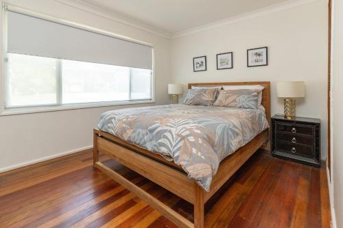 Postel nebo postele na pokoji v ubytování Lizzie Shack