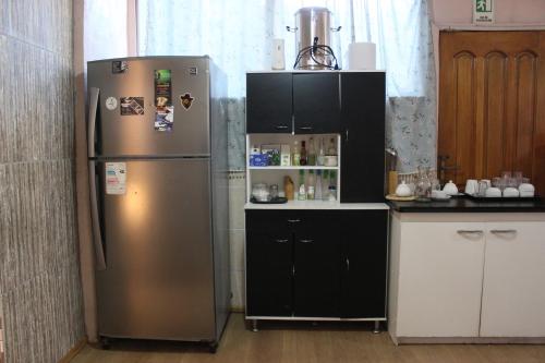 Η κουζίνα ή μικρή κουζίνα στο Habitaciones cerca Movistar en San Ignacio 1230 con desayuno