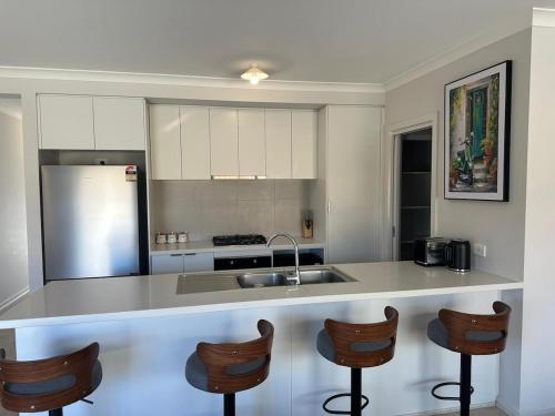 Kuchyň nebo kuchyňský kout v ubytování Family Time by the park