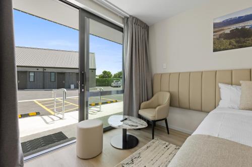 Postel nebo postele na pokoji v ubytování Brookside Motel