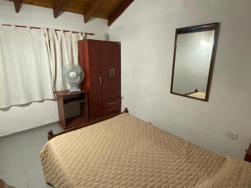 Postel nebo postele na pokoji v ubytování Dos ruedas