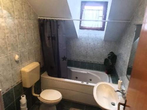 Ванная комната в One Bedroom Magic Room 1