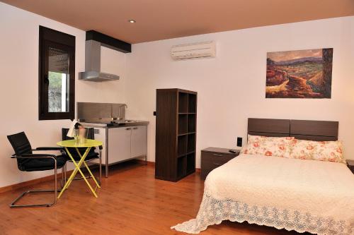 Postel nebo postele na pokoji v ubytování Hotel Bon Lloc