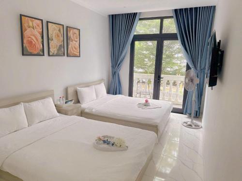 Ένα ή περισσότερα κρεβάτια σε δωμάτιο στο La Maison De DiNo