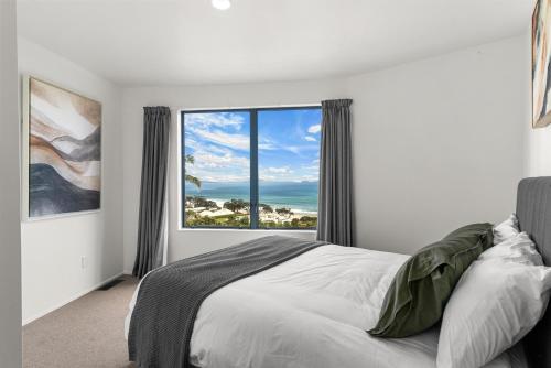 Postel nebo postele na pokoji v ubytování Langscape - Langs Beach Holiday Home