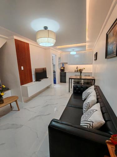 Posezení v ubytování Chi's Homestaycation