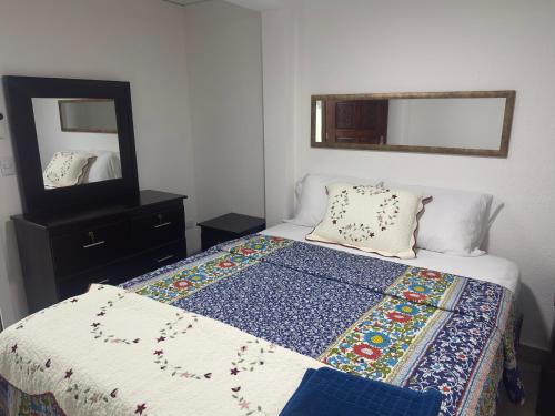 Ένα ή περισσότερα κρεβάτια σε δωμάτιο στο Atractivo apartamento