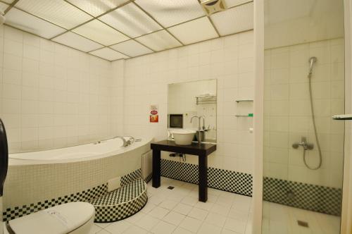 Koupelna v ubytování Hua Xiang Motel - Da Liao