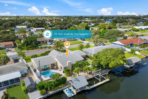 an aerial view of a villa with a marina at 445 Watts Way in Cocoa Beach
