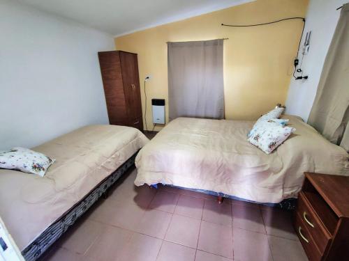 Ένα ή περισσότερα κρεβάτια σε δωμάτιο στο La casita de Don Emilio