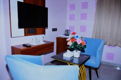 Μια τηλεόραση ή/και κέντρο ψυχαγωγίας στο Hotel Mohan Palace