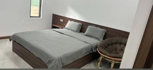 Postel nebo postele na pokoji v ubytování Khách sạn grace hotel dakmil