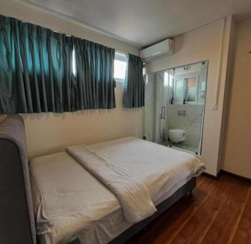 Postel nebo postele na pokoji v ubytování sams apartment