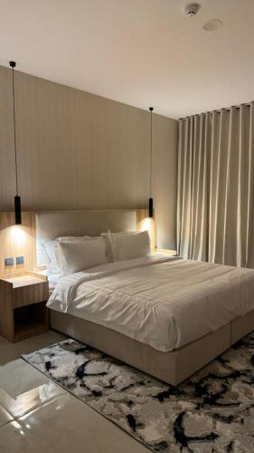 Giường trong phòng chung tại بيات للشقق المخدومة