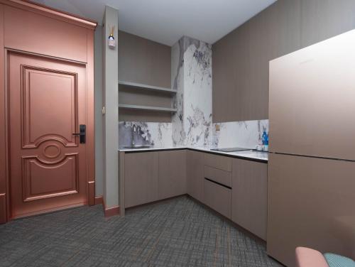 Η κουζίνα ή μικρή κουζίνα στο Amgun Hotel Ulaanbaatar