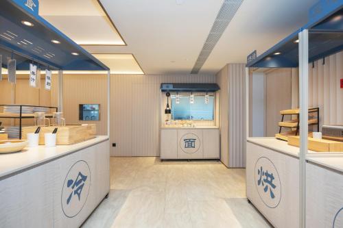 Φωτογραφία από το άλμπουμ του Hanting Hotel Shanghai Yishan Road Center σε Σαγκάη