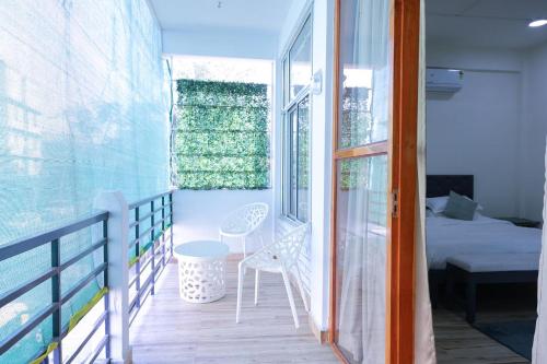 Postel nebo postele na pokoji v ubytování La Lola