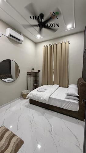 Ένα ή περισσότερα κρεβάτια σε δωμάτιο στο Villa Amazon Private Pool