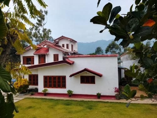a view of the house from the garden at Penthouse Bandarawela in Bandarawela