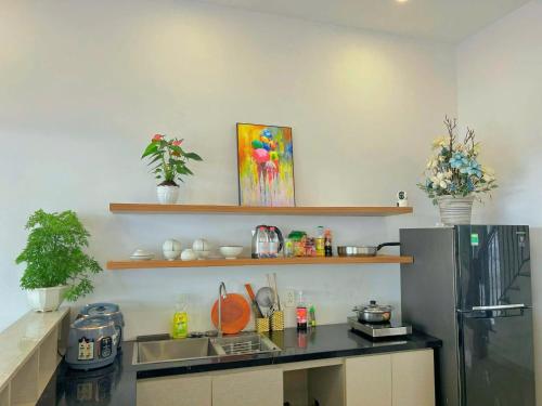 Kuchyň nebo kuchyňský kout v ubytování La Maison De DiNo