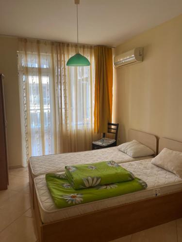 Postel nebo postele na pokoji v ubytování Apartments Sea Sounds