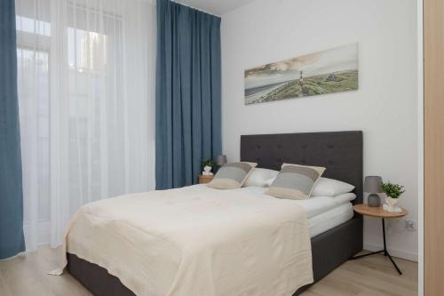 Foto Stylish Apartment in Browary Warszawskie with Air Conditioning & Parking by Noclegi Renters 1