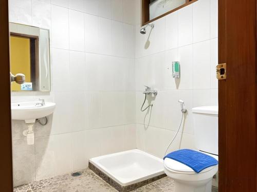 Koupelna v ubytování Pondok Jatim Park Hotel & Cafe