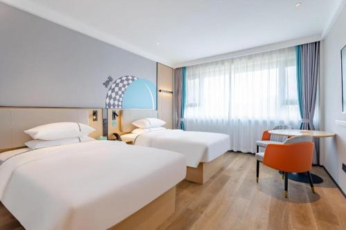 Postel nebo postele na pokoji v ubytování City Comfort Inn Guilin Qixing Park Dongxi Alley