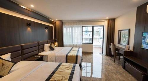 Postel nebo postele na pokoji v ubytování CoTo Starlight Boutique Hotel