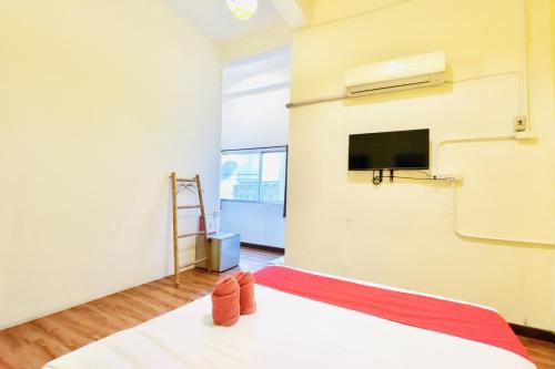 TV a/nebo společenská místnost v ubytování The Yak Cozy Chiang Mai