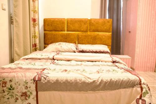 Postel nebo postele na pokoji v ubytování ftrealtyproperties Tango Suites 2