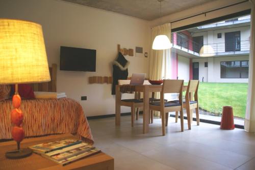 TV a/nebo společenská místnost v ubytování El Oasis Apart Hotel