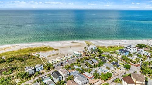 an aerial view of a beach and the ocean at Toes in the Sand - 113 in Sarasota