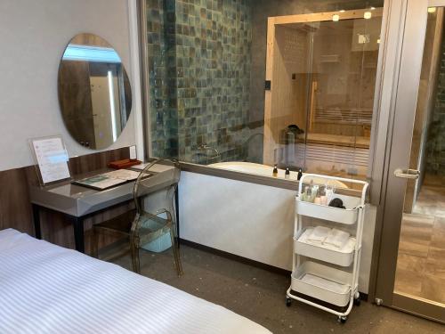 Koupelna v ubytování クリスタルパーク久松