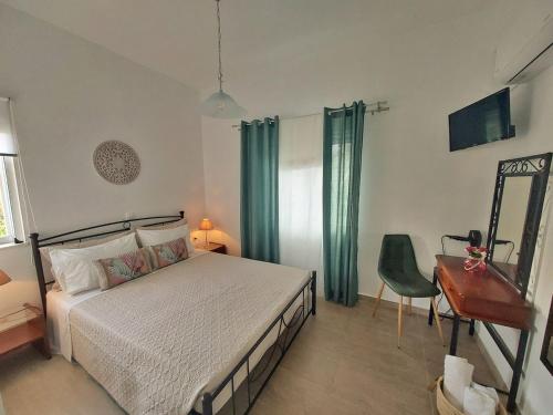 Ένα ή περισσότερα κρεβάτια σε δωμάτιο στο Dimitra's Pretty Apartment 4 klm away from Chora