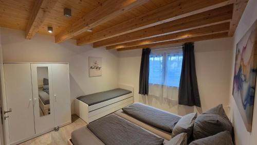 Postel nebo postele na pokoji v ubytování Pfeifers OdenwaldNest